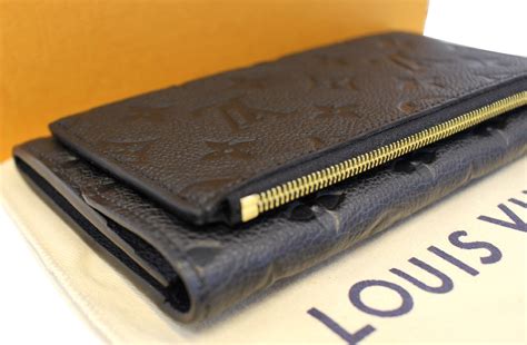 louis vuitton black monogram empreinte leather curieuse wallet|Louis Vuitton emporium handbags.